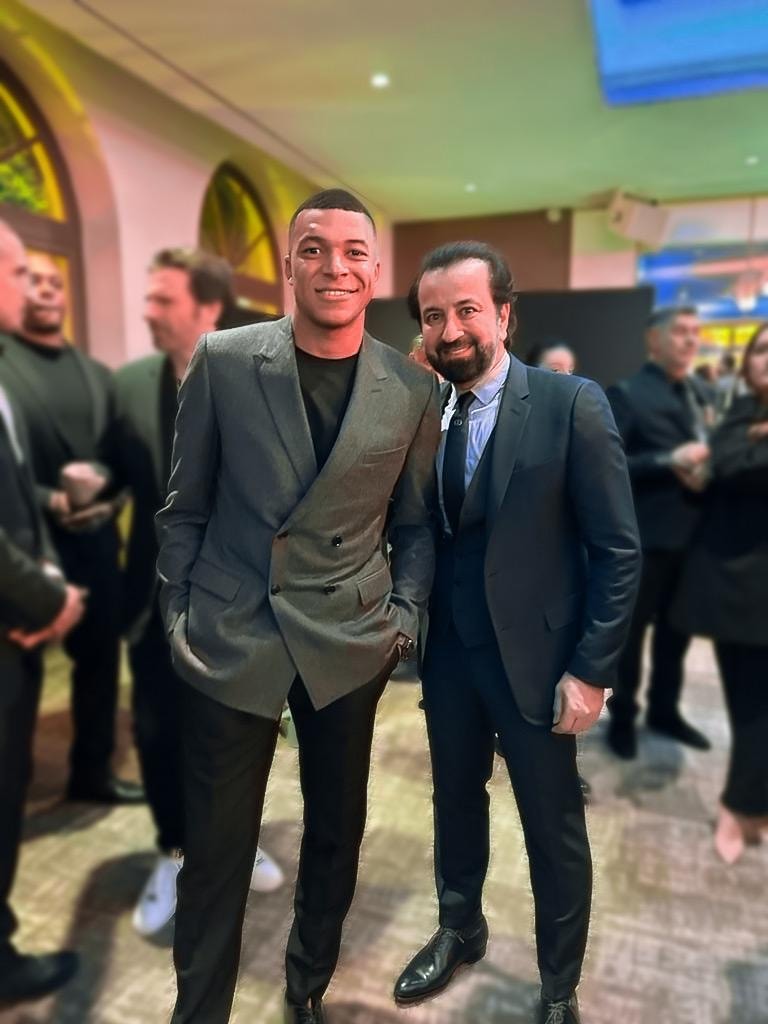 Adel Mardini with Kylian Mbappé